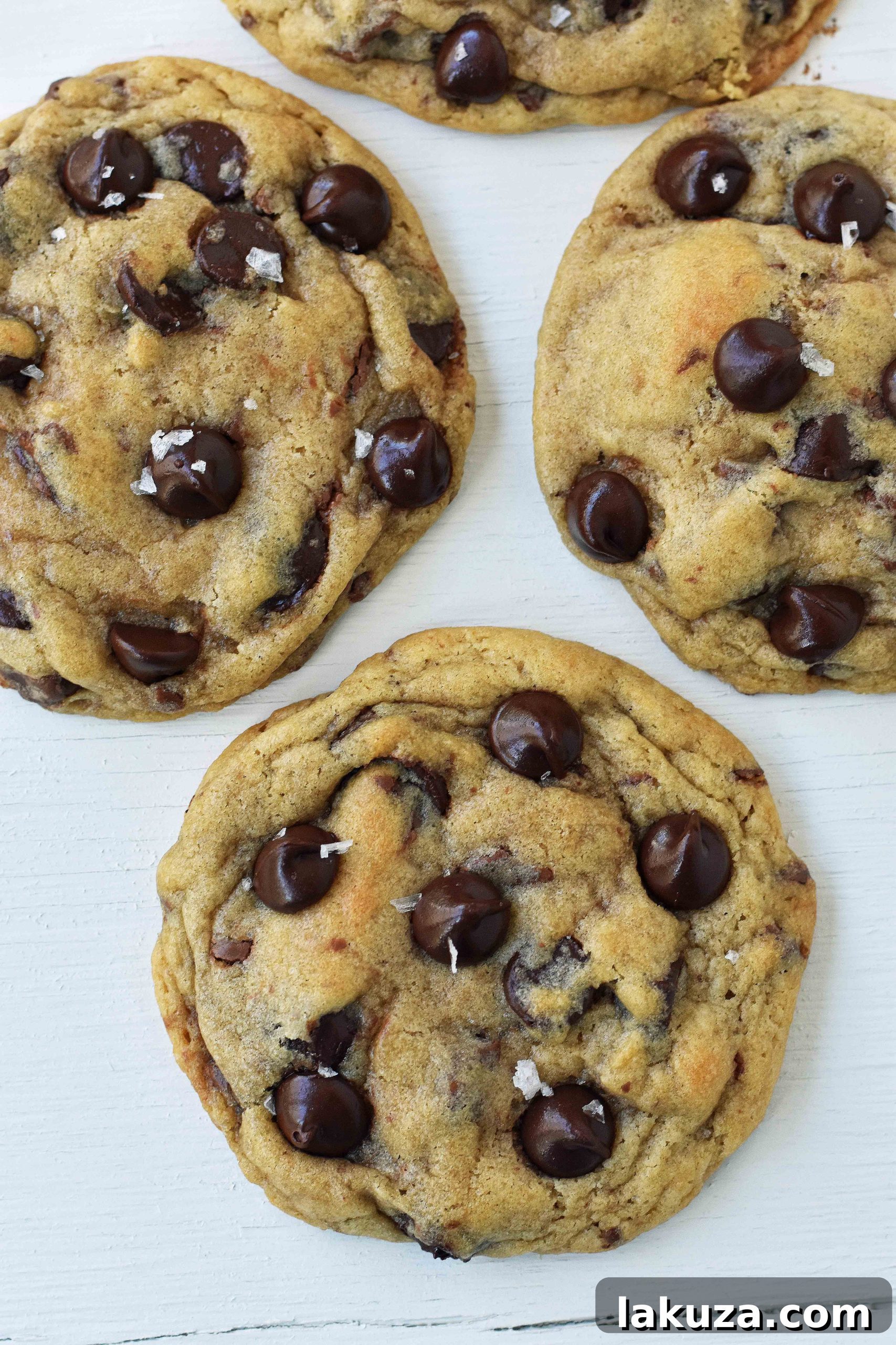 Discover the best chocolate chip cookie recipe with Charmina's method, featuring both melted and softened butter, for an irresistibly chewy and flavorful homemade treat. www.modernhoney.com