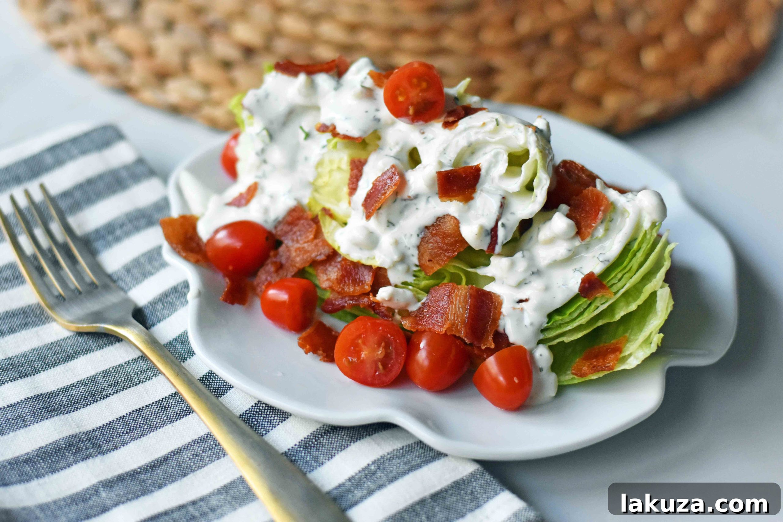 Iconic BLT Wedge 2 Ultimate BLT Wedge Salad: Crisp iceberg lettuce, fresh cherry tomatoes, crispy bacon, drizzled with homemade creamy ranch or blue cheese dressing. A timeless crowd-pleaser and steakhouse classic.