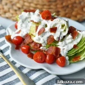 Iconic BLT Wedge 6 Ultimate BLT Wedge Salad made with crisp iceberg lettuce, fresh cherry tomatoes, crispy bacon, with a homemade creamy ranch or blue cheese dressing. A classic, crowd-favorite salad.
