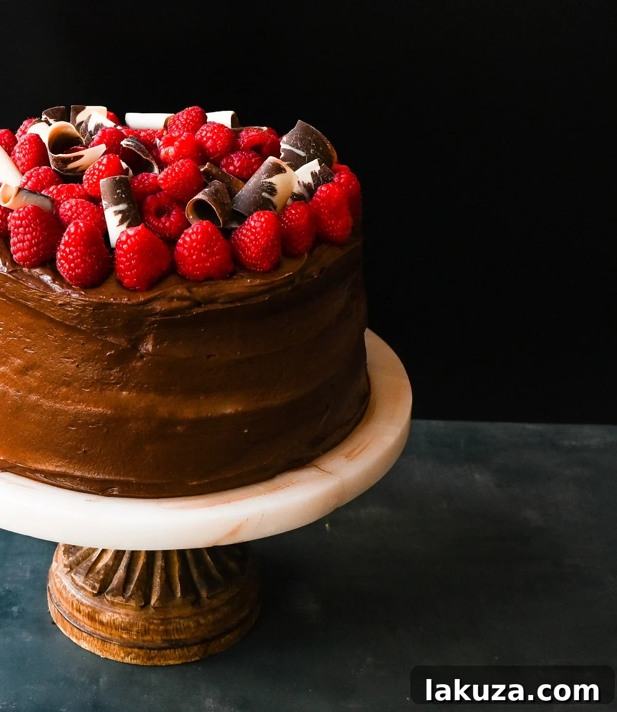 Decadent Chocolate Raspberry Delight 5 Detailed shot of the chocolate cake layers and raspberry cream filling.