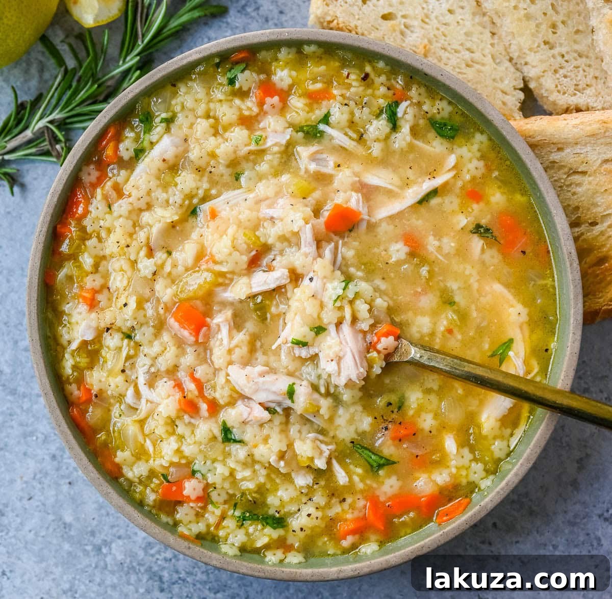 Heartwarming Italian Pastina Soup 2 A steaming bowl of classic Italian Pastina Soup with tiny star pasta and fresh parsley garnish, perfect for a cold day.