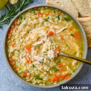 Heartwarming Italian Pastina Soup 8 A close-up of Italian Pastina Soup with a focus on the tiny pasta and rich broth.