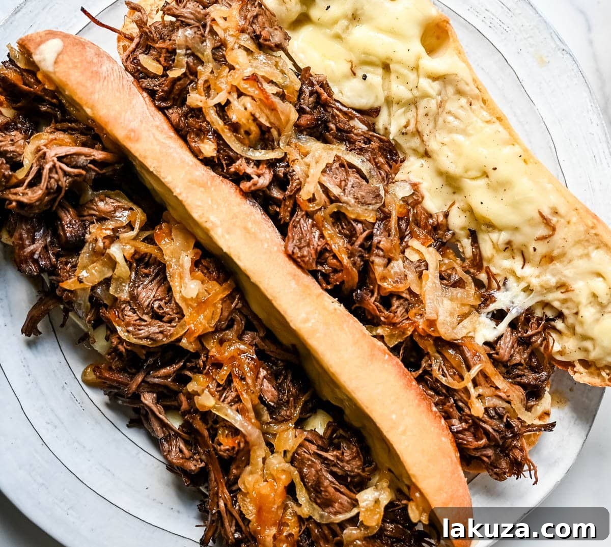 Effortless Slow Cooker French Dip Sandwiches 3 This easy slow cooker French dip sandwich recipe features tender beef, savory au jus, caramelized onions, and melted provolone cheese. Finished with a creamy horseradish aioli, it’s a restaurant-quality sandwich made right at home.