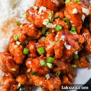 Sticky Honey Sriracha Chicken 8 Crispy Honey Sriracha Chicken pieces coated in a glossy, sweet and spicy glaze.