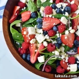 Spinach Berry Salad with Sweet Poppyseed Dressing. Fresh Spinach Salad with Berries, Feta Cheese, and Poppy Seed Dressing. www.modernhoney.com