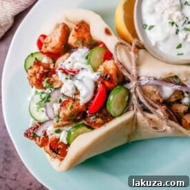 Greek Chicken Gyros with Tzatziki Sauce. How to make the best chicken gyros at home.