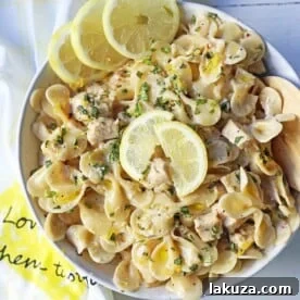 Creamy Lemon Chicken Pasta.Sauteed chicken in a rich creamy lemon basil sauce tossed with your favorite kind of pasta.  A quick and easy 30-minute meal! www.modernhoney.com #lemonpasta #lemonchickenpasta #pasta #pastarecipes