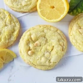 Lemon White Chocolate Chip Cookies. Soft and chewy lemon sugar cookies with white chocolate chips. White Chocolate Lemon Cookies Recipe. www.modernhoney.com