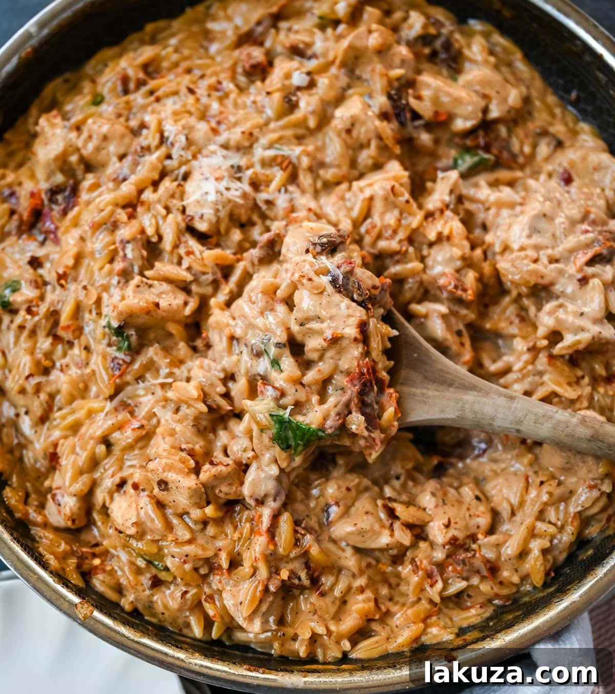 This Marry Me Chicken Orzo is a creamy, one-pan dinner made with tender chicken, sun-dried tomatoes, parmesan, and perfectly cooked orzo pasta. Inspired by the viral “marry me chicken” recipe, this version adds orzo to soak up the rich garlic cream sauce for an easy comfort meal. 