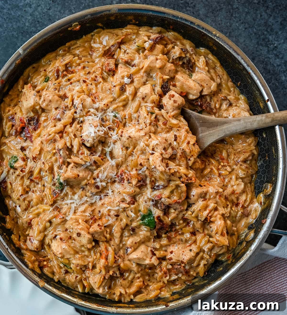This Marry Me Chicken Orzo is a creamy, one-pan dinner made with tender chicken, sun-dried tomatoes, parmesan, and perfectly cooked orzo pasta. Inspired by the viral “marry me chicken” recipe, this version adds orzo to soak up the rich garlic cream sauce for an easy comfort meal. 