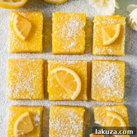 Lemon Bars made with tangy and sweet lemon curd and a buttery shortbread crust.
