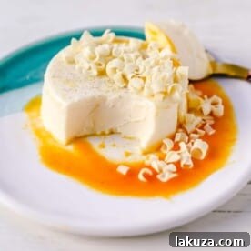 Silky smooth, creamy vanilla bean Panna Cotta made with cream, sugar, gelatin, and vanilla beans, an Italian favorite.