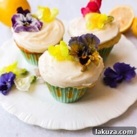 Light, fluffy homemade lemon cupcakes with fresh lemon frosting.