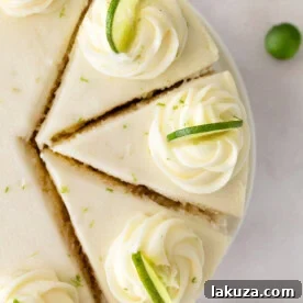 Moist key lime cake with sweet cream cheese frosting and a light, fluffy citrus lime buttercream frosting.