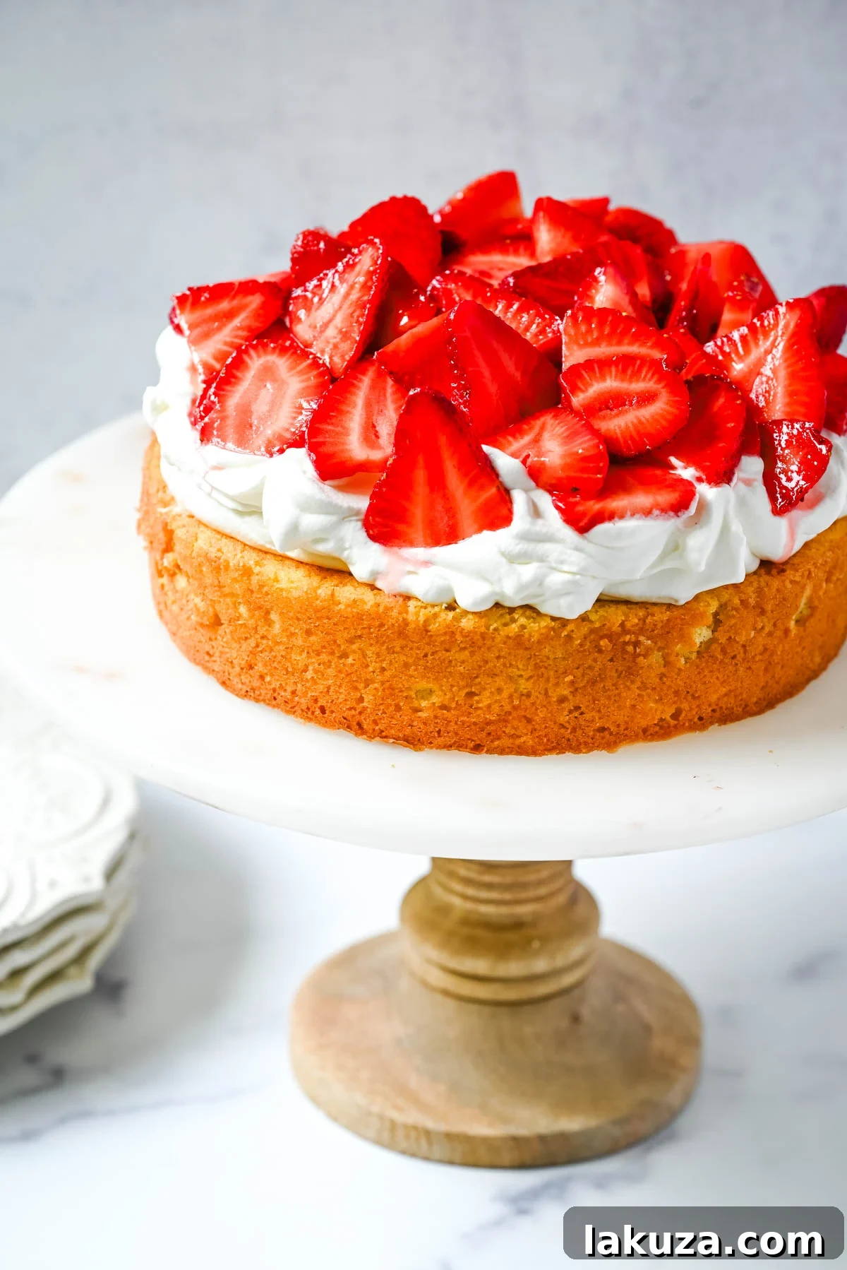Fresh Strawberry Shortcake Delight 6 This Strawberry Shortcake Cake is a soft, buttery vanilla cake layered with fluffy homemade whipped cream and juicy strawberries. It’s the perfect spring and summer dessert that tastes like a classic strawberry shortcake but in an easy-to-slice cake form.