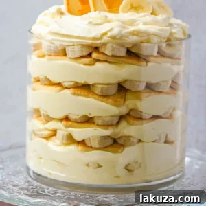 A dish of banana pudding with Chessmen cookies.