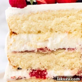 Delicious Strawberry Recipes for Every Occasion 13 Berry Chantilly cream cake layered with chantilly cream and fresh berries.