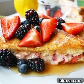 Delicious Strawberry Recipes for Every Occasion 9 Strawberries and cream stuffed French toast with cream cheese and jam.