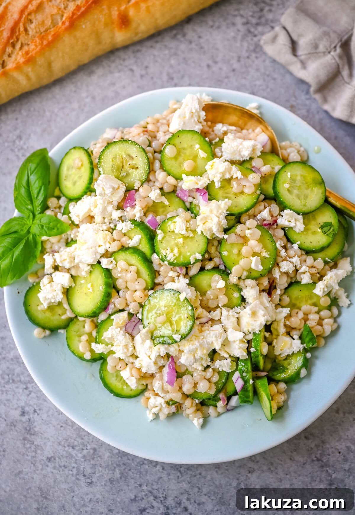 Refreshing Cucumber, Couscous & Feta Salad Recipe 2 This cucumber couscous salad is the ultimate fresh and easy Mediterranean inspired recipe that is light, flavorful, and ready in just 20 minutes. Fluffy couscous is tossed with crisp English cucumber, red onion, and creamy feta cheese then drizzled with a bright and tangy lemon vinaigrette that makes the best fresh side dish!