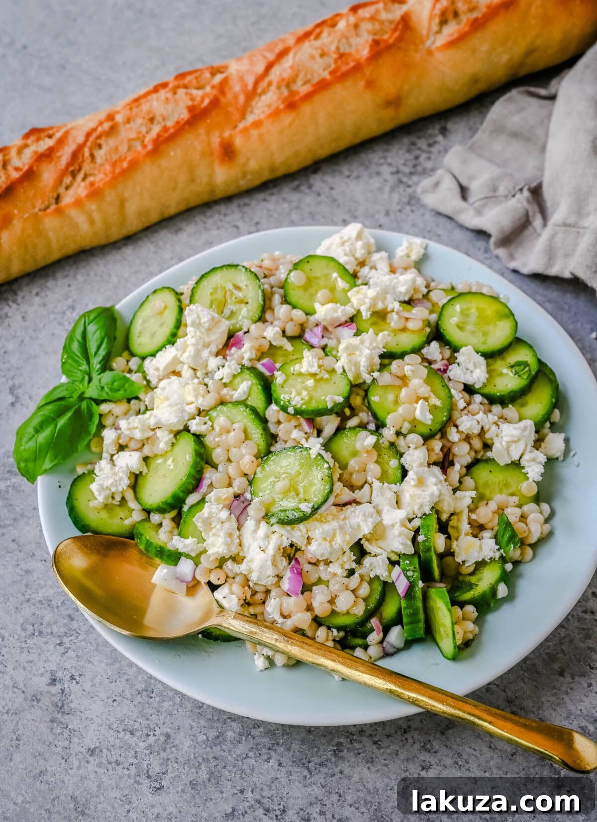 Refreshing Cucumber, Couscous & Feta Salad Recipe 3 This cucumber couscous salad is the ultimate fresh and easy Mediterranean inspired recipe that is light, flavorful, and ready in just 20 minutes. Fluffy couscous is tossed with crisp English cucumber, red onion, and creamy feta cheese then drizzled with a bright and tangy lemon vinaigrette that makes the best fresh side dish!