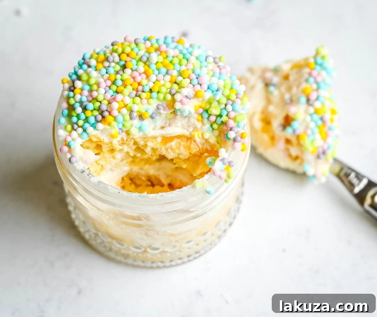 Jarred Dot Cake Recipe: Layered Mini Cakes in a Jar 8 This viral dot cake recipe brings the NYC sprinkle cake trend straight to your kitchen — no trip to Butterfield Market required! Soft, buttery homemade yellow cake layered in a cup, topped with creamy vanilla buttercream, and completely coated in rainbow nonpareil sprinkles for that irresistible crunch. This easy homemade version is better than any boxed mix recipe you'll find — and takes less than an hour to make!