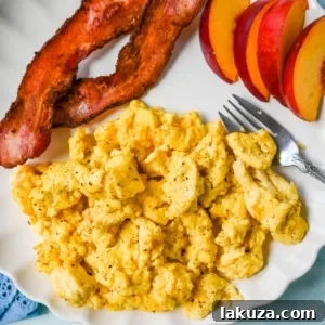 These Cottage Cheese Scrambled Eggs are the creamiest, fluffiest scrambled eggs you'll ever make — with over 20g of protein per serving!