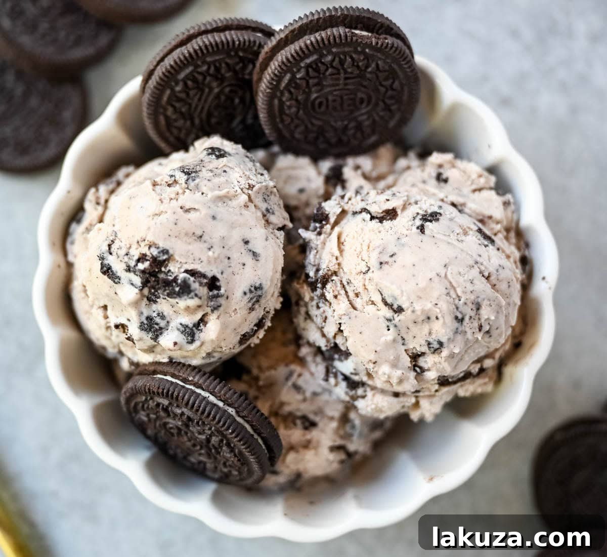 This Cookies and Cream Ice Cream is rich, creamy, and loaded with Oreo chunks. This Oreo Ice Cream is made with a custard base for the smoothest, creamiest homemade ice cream you'll ever make.